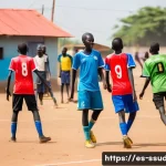 Home 20 남수단에서 축구 선수로 성장하는 법 - A vibrant street soccer scene in Juba, South Sudan, showing young male and female players wearing co...